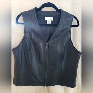 Womens genuine black leather vest. Size large.